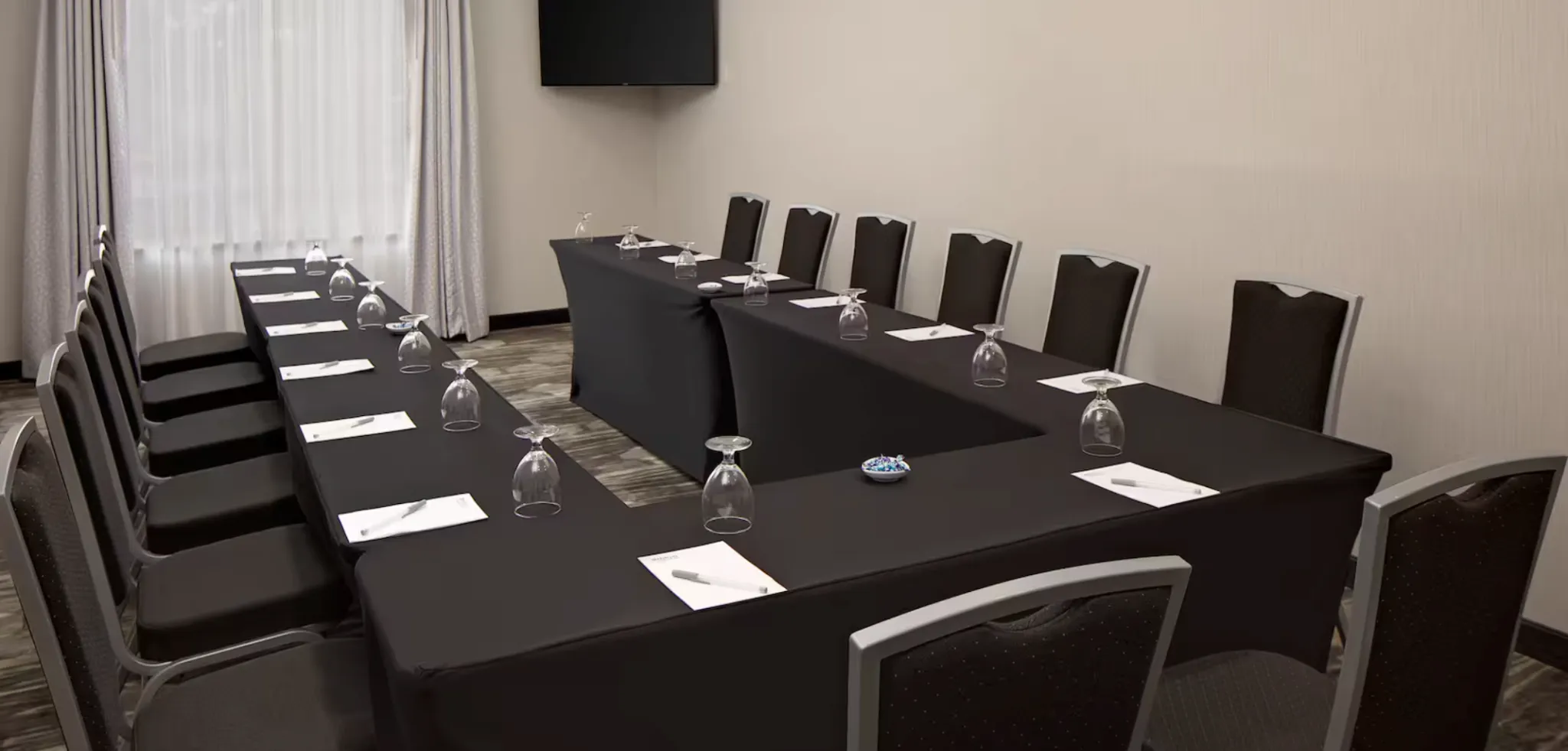 The meeting room set for a small group around one table